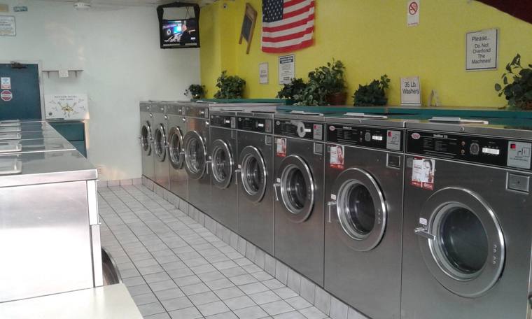 Astoria Laundromat — attended drop-off laundry counter at 6440 S Pulaski Rd in Archer Heights, Chicago