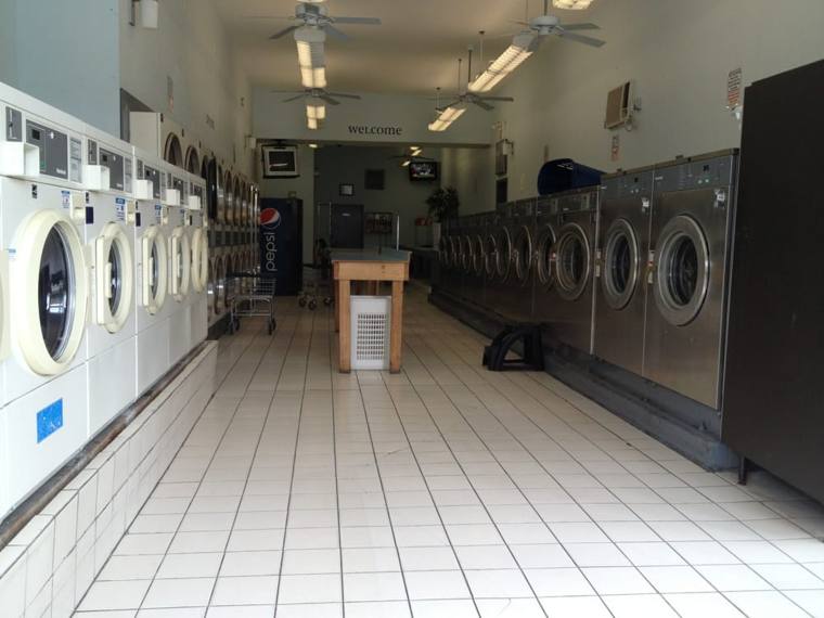 Central Cleaners — attended drop-off laundry counter at 5602 W Madison St in Austin, Chicago