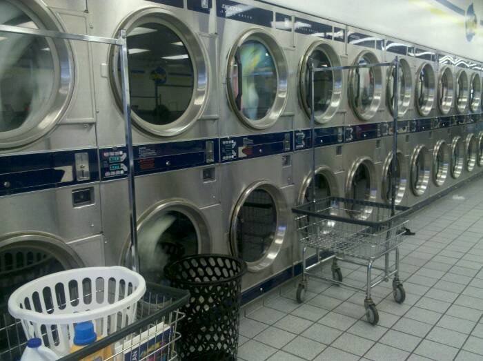 Spin Cycle Coin Laundry — attended drop-off laundry counter at 7118 W Grand Ave in Austin, Chicago