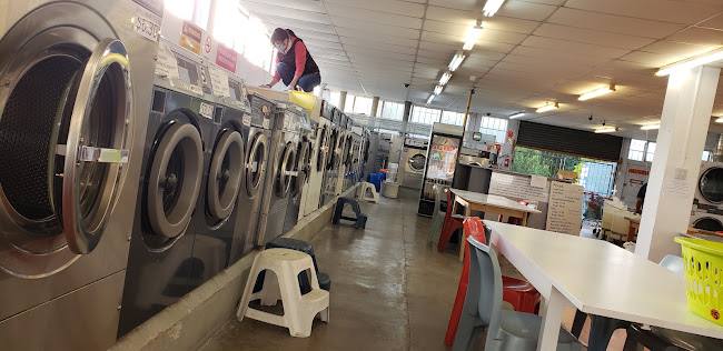 Super One Hour Dry Cleaners — attended drop-off laundry counter at 5654 W Division St in Austin, Chicago