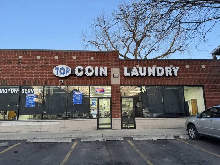Coin Laundry — attended drop-off laundry counter at 2700 N Austin Ave in Belmont Cragin, Chicago