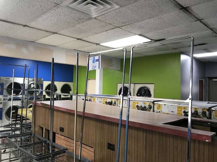 Smitty's Cleaners — attended drop-off laundry counter at 3540 S Indiana Ave in Bronzeville, Chicago