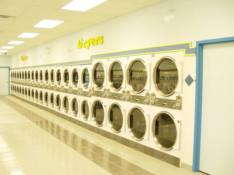 Golden Hanger — attended drop-off laundry counter at 1314 E 53rd St in Hyde Park, Chicago