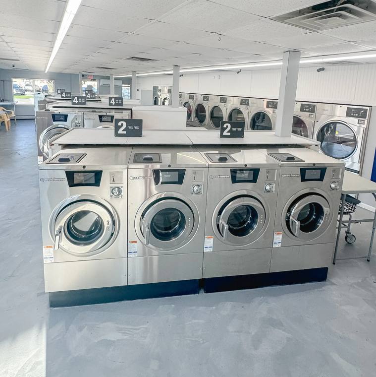 Chris Cleaners — attended drop-off laundry counter at 432 W Belmont Ave Apt 101 in Lakeview, Chicago