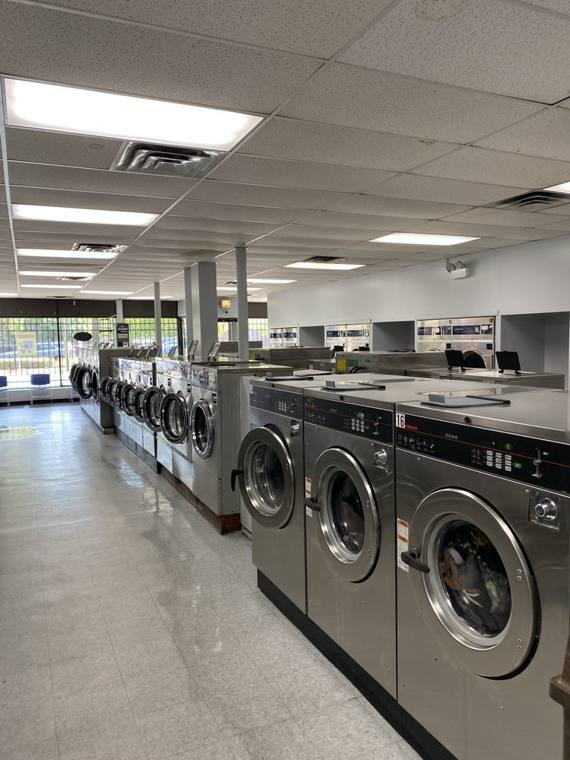 Wellington Cleaners — attended drop-off laundry counter at 3011 N Halsted St in Lakeview, Chicago