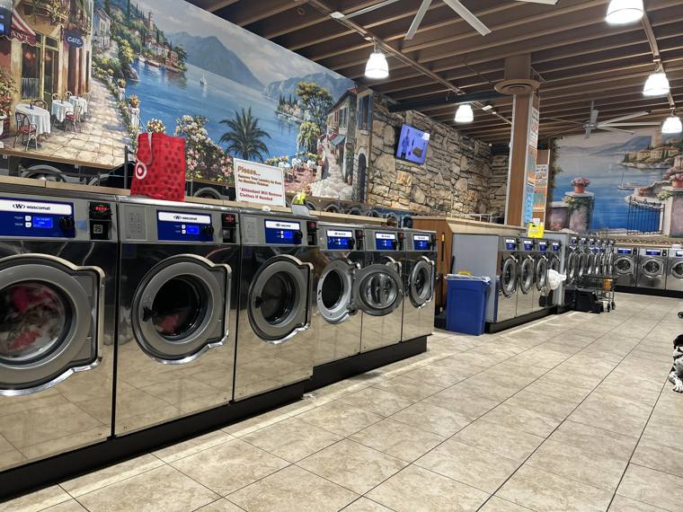 Supreme Laundry Service — attended drop-off laundry counter at 2341 N Commonwealth Ave in Lincoln Park, Chicago
