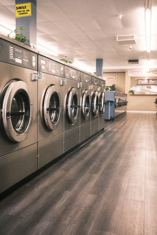King Cleaners & Tailors — attended drop-off laundry counter at 25 E Delaware Pl in Near North Side, Chicago