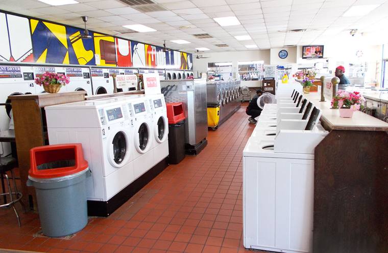 Sheen Cleaners & Tailors — attended drop-off laundry counter at 110 E Delaware Pl in Near North Side, Chicago