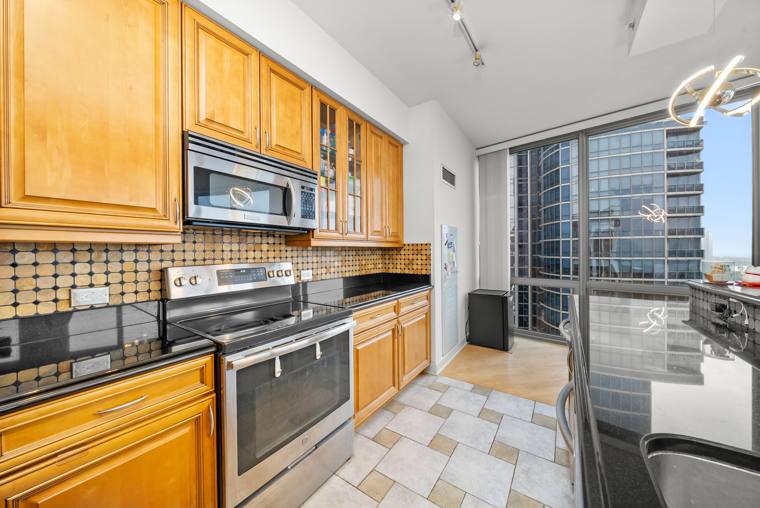CJ Cleaners — attended drop-off laundry counter at 1331 S Prairie Ave in South Loop, Chicago