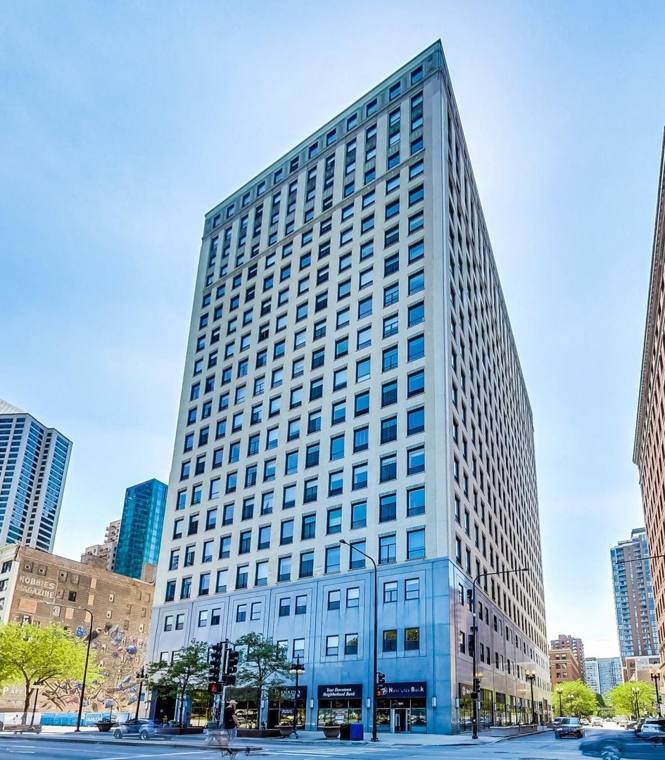Pleasure Cleaners — attended drop-off laundry counter at 910 S Michigan Ave in South Loop, Chicago