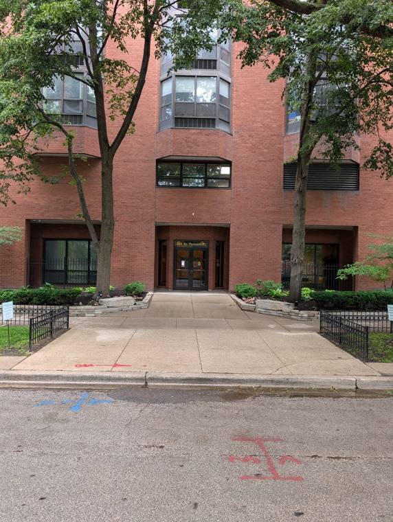 Primo Cleaners — attended drop-off laundry counter at 899 S Plymouth Ct in South Loop, Chicago