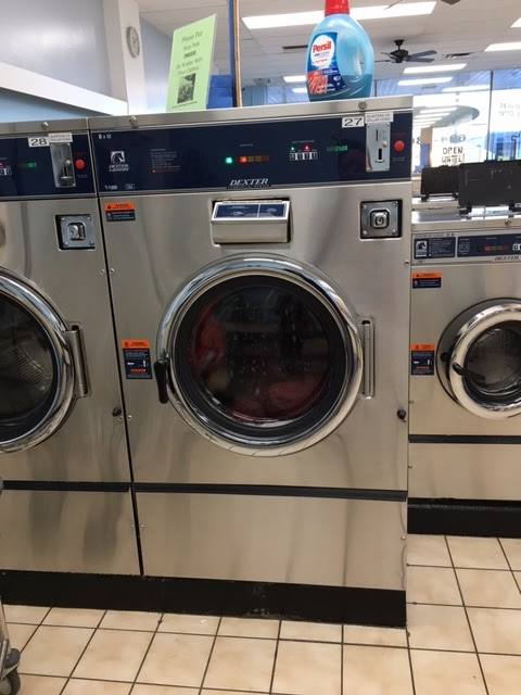 Division Cleaners — attended drop-off laundry counter at 1508 W Division St in Wicker Park, Chicago